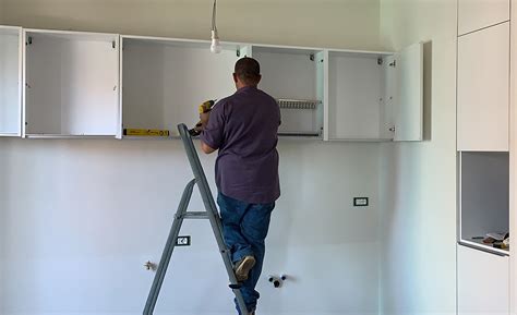 how to hang wall cabinets on steel studs|how to hang cabinets on metal studs.